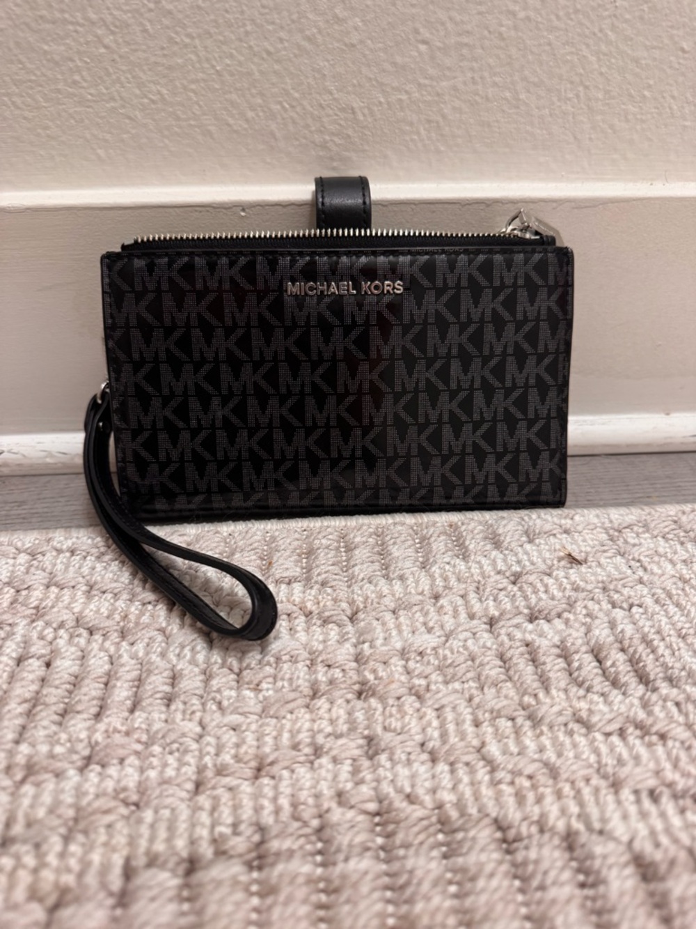 Michael Kors Black Monogram Wristlet with Gold Logo